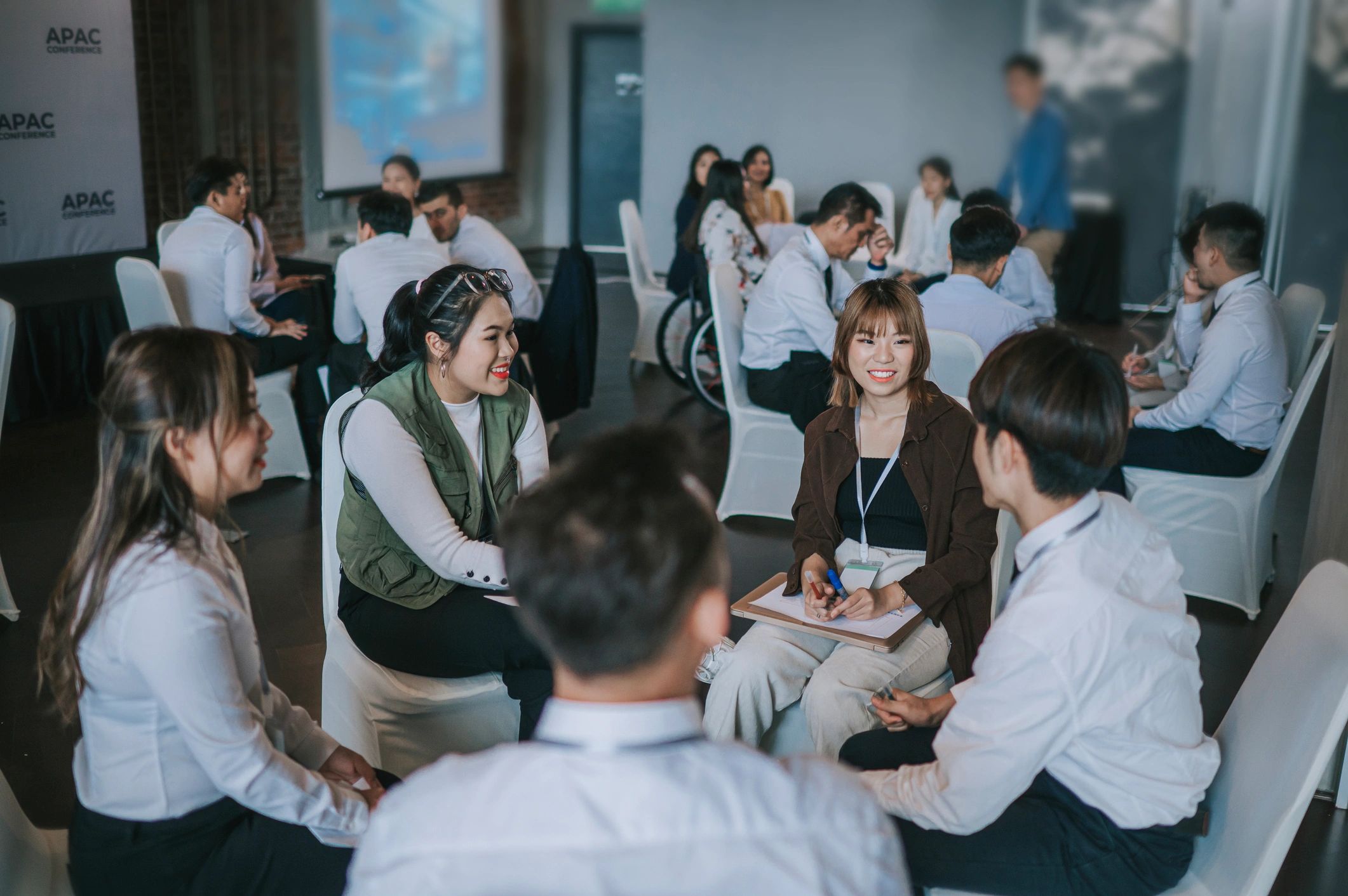 Workshop participants in small group discussion